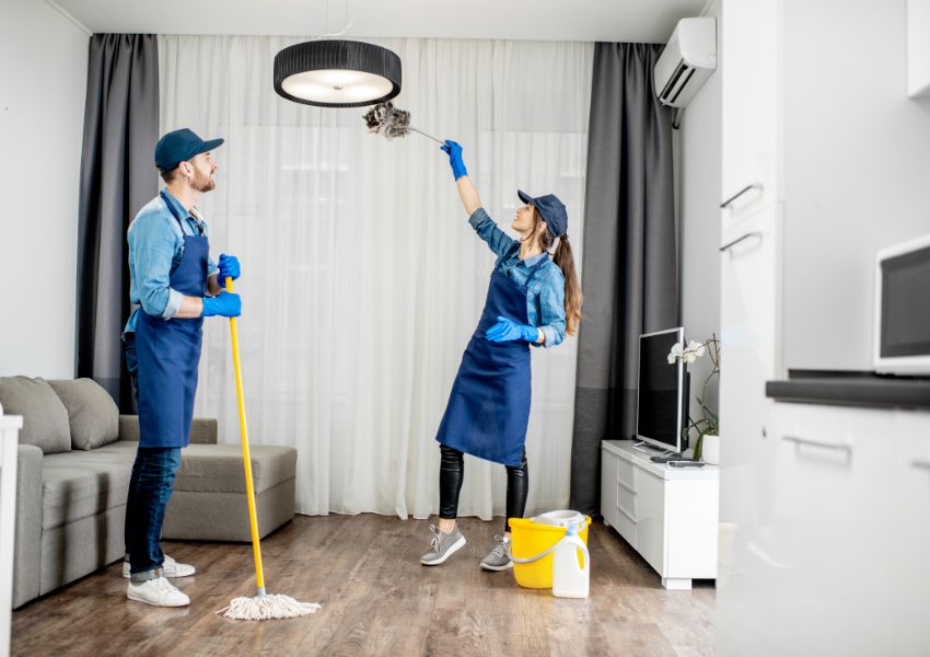 two-professional-cleaners-cleaning-roof-light