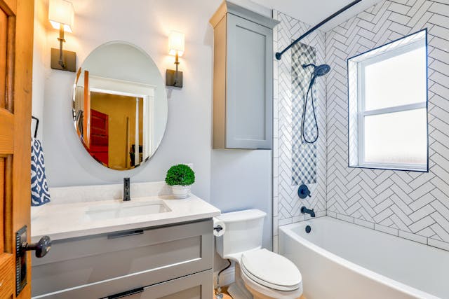 White-bathroom-with-oval-mirror